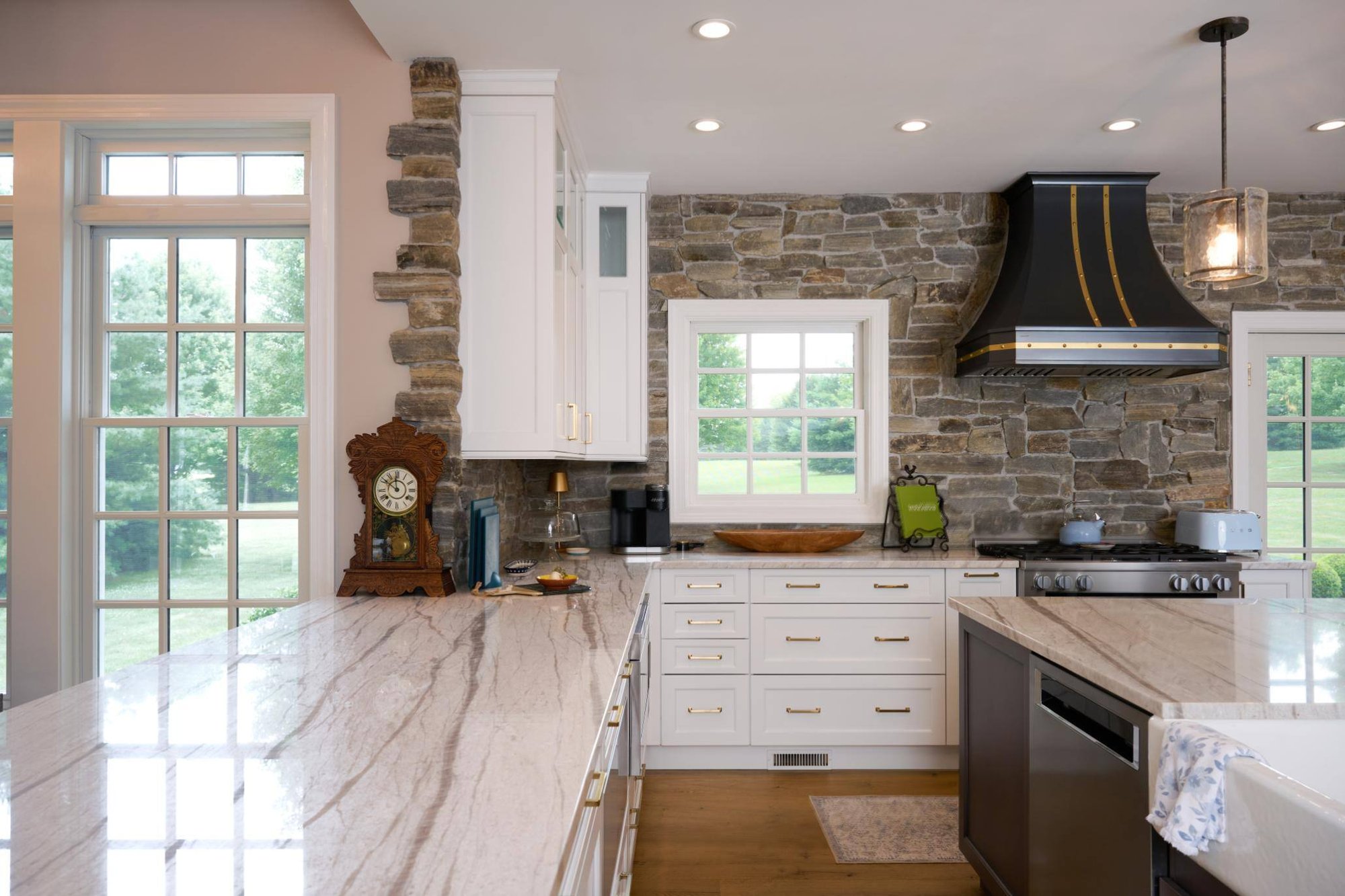 Kitchen area and island in 4-season room addition by GTG Builders in Central, NJ