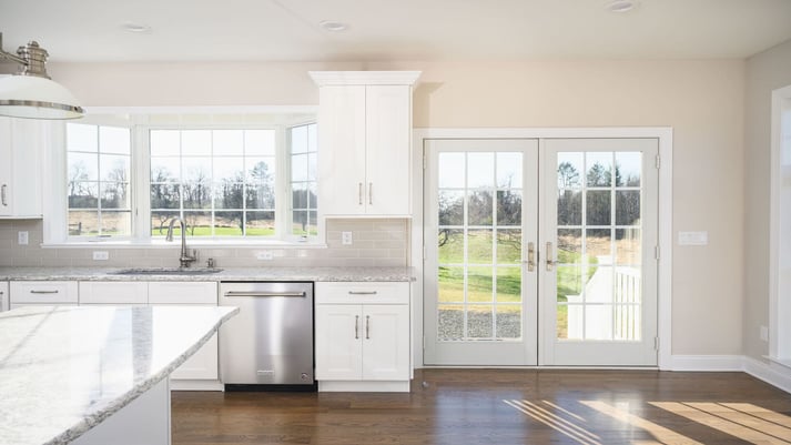 kitchen with white cabinets and hardwood floors in central new jersey custom by GTG Builders