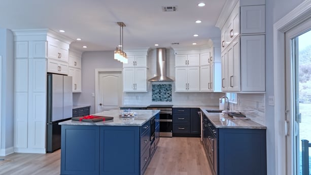 Spacious kitchen layout with large island and ample natural light in a net-zero custom home in Bloomsbury, NJ by GTG Builders