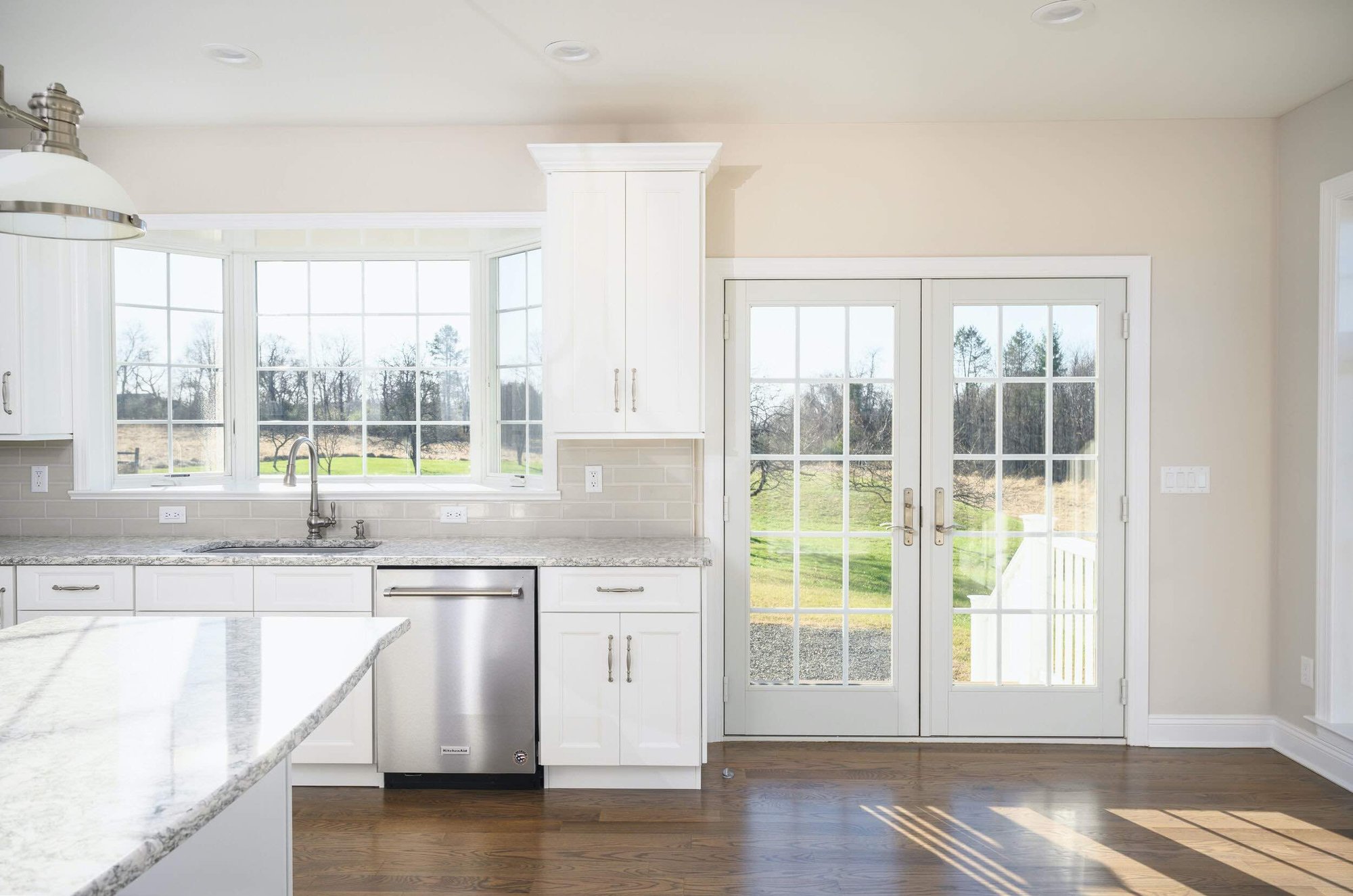 Bright White Kitchen by GTG Builders