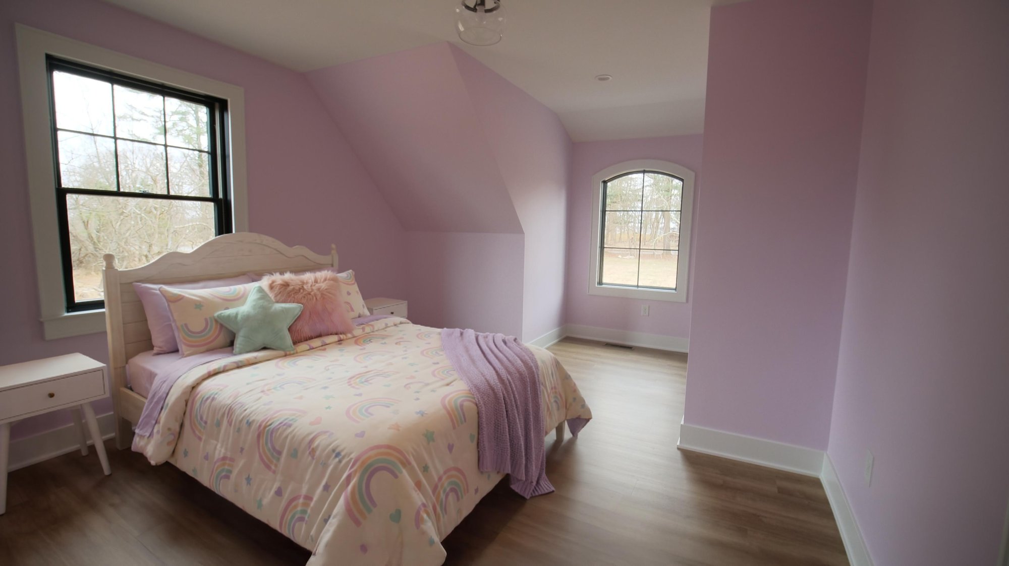 lavender bedroom with premium windows in custom home by gtg builders