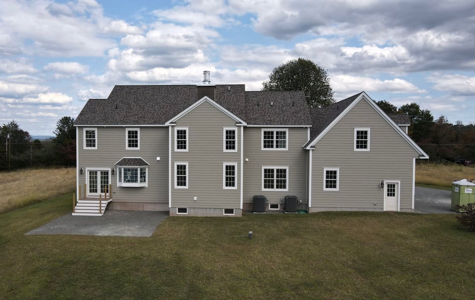 back of large custom house in nj by gtg builders