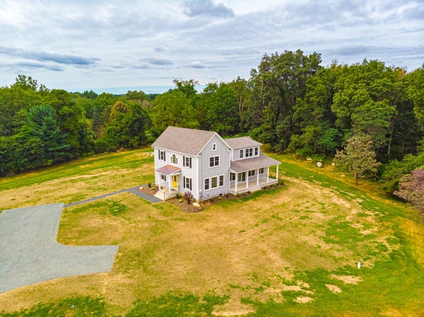 Beautiful custom home with back porch and large backyard in Central, NJ by GTG Builders
