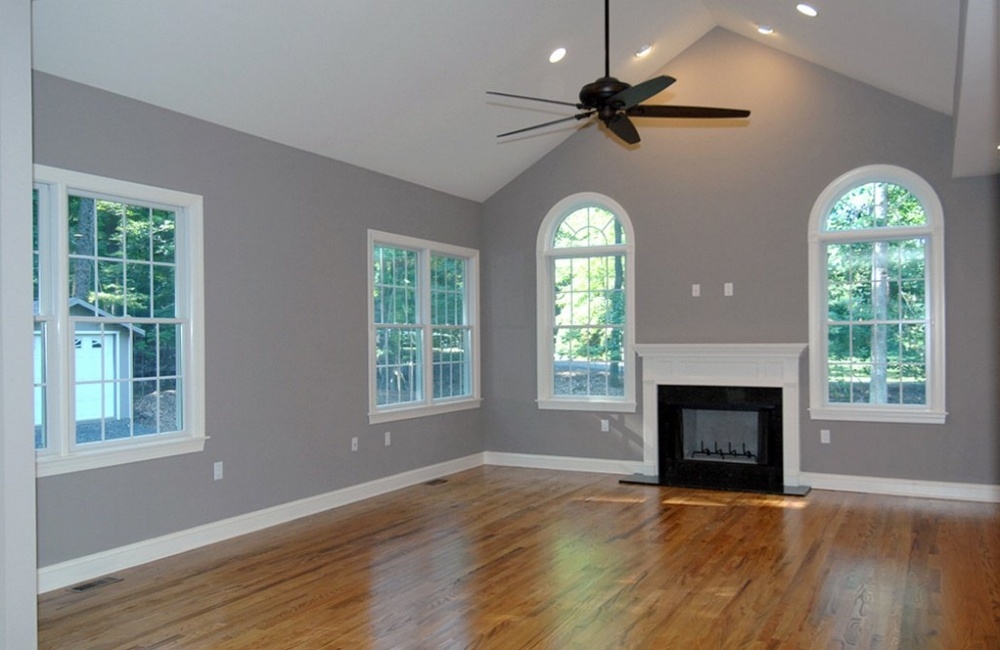 living room with fire place and hardwood floors in custom home by gtg builders in central new jersey
