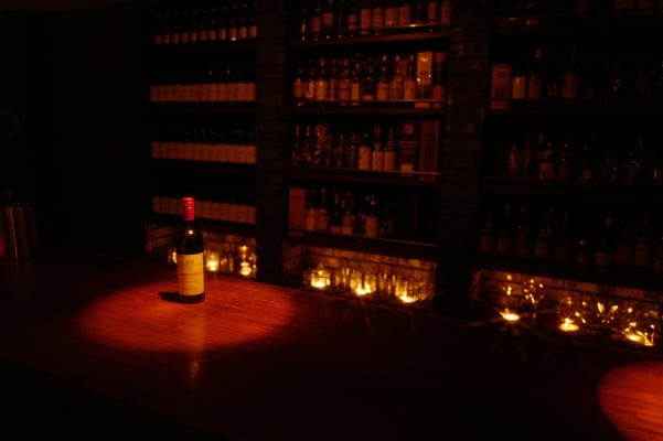 cozy booth in home wine cellar