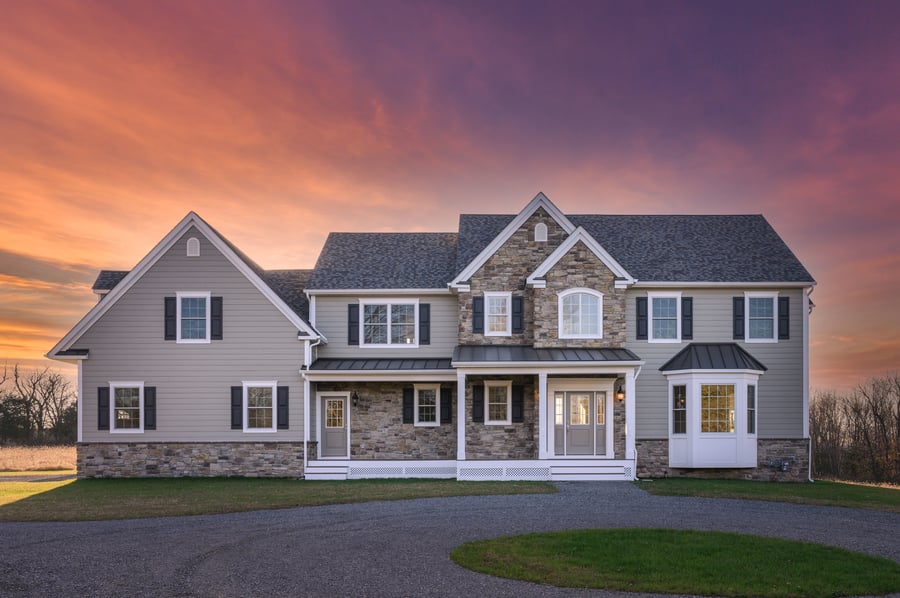 new jersey home with sunset background by gtg builders in new jersey