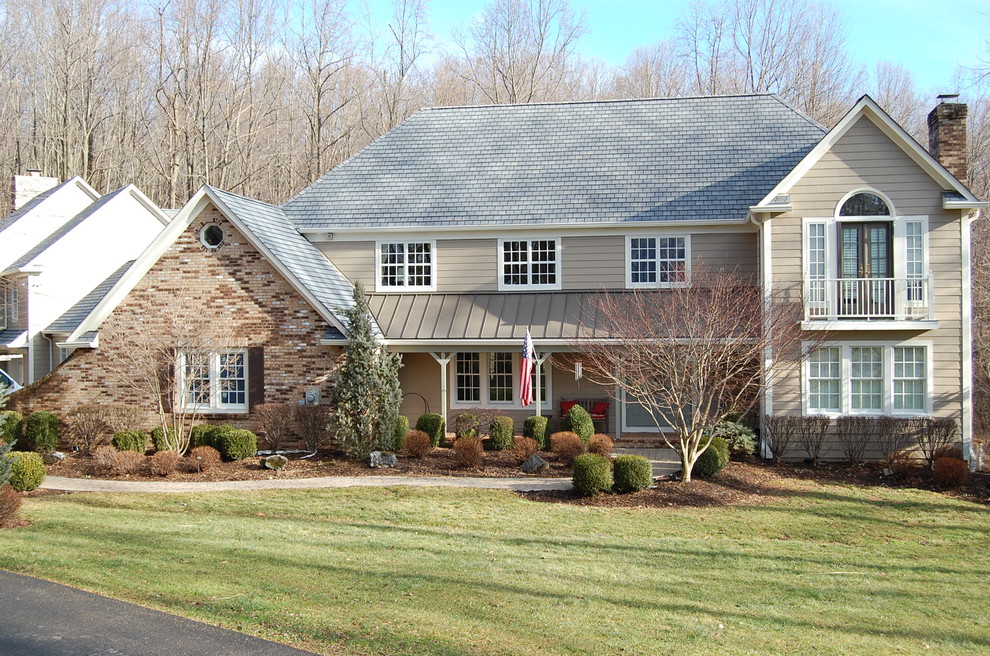 ranch style home brown exterior by gtg builders in new jersry