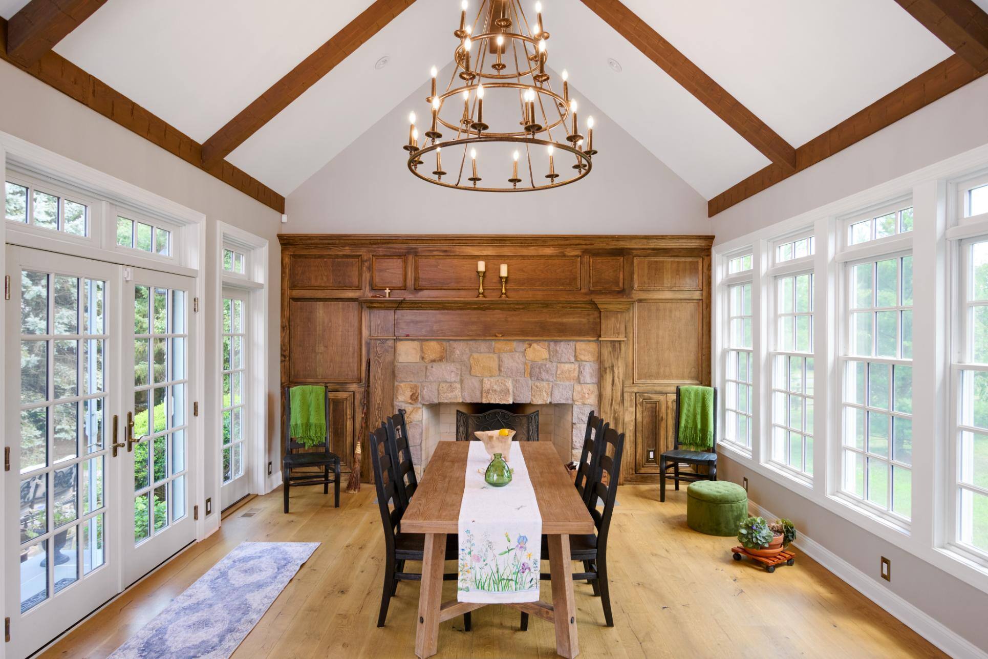 4-season room addition dining table in front of fireplace by GTG Builders in Central, NJ 4-season room addition dining table in front of fireplace by GTG Builders in Central, NJ