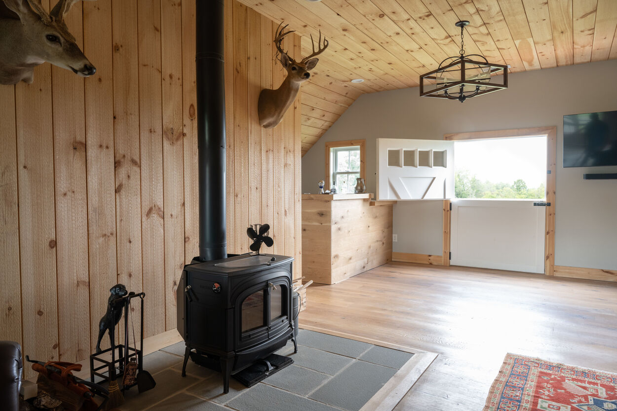 black wood stove by GTG Builders in Stockton, New Jersey