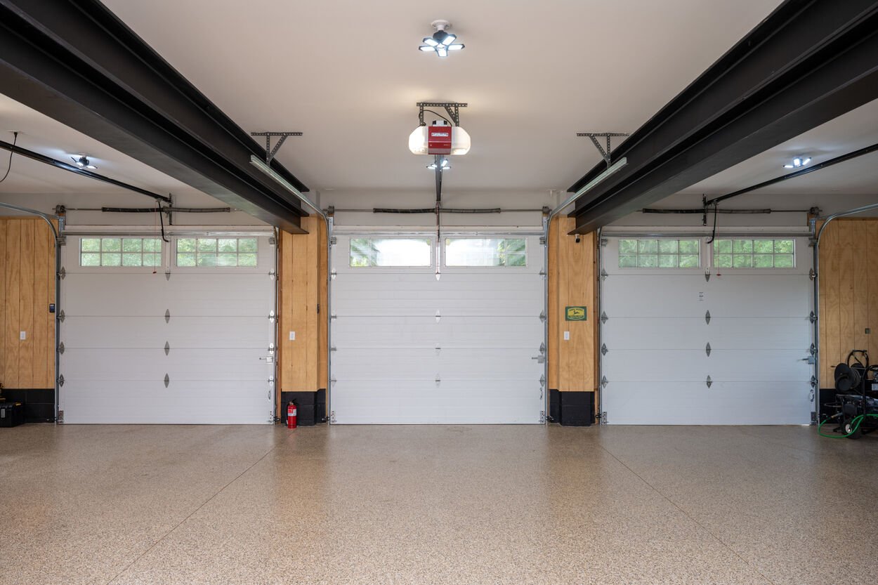 3 garage doors on 1st floor by GTG Builders in Stockton New Jersey
