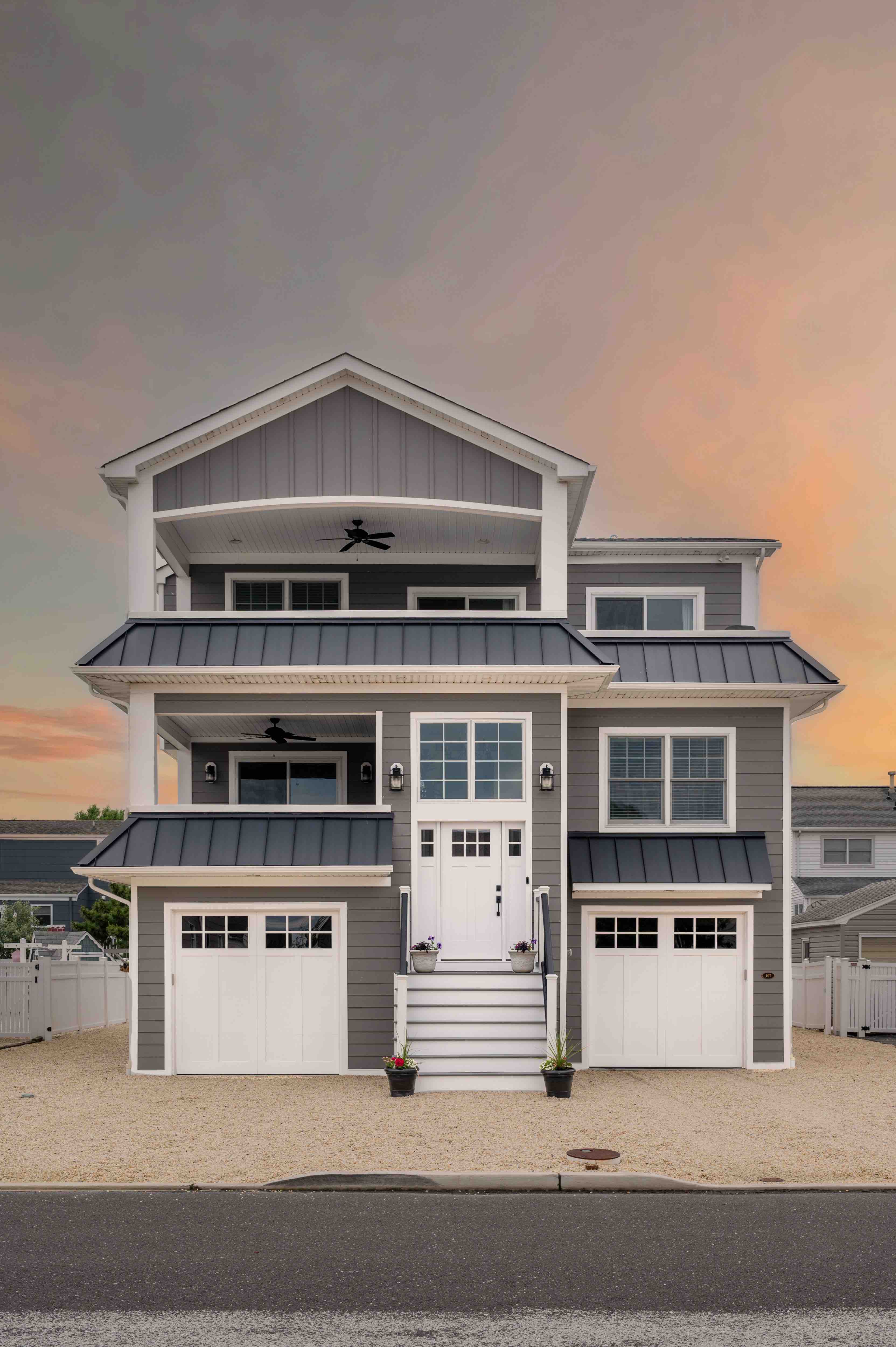 Exterior of grey two story custom home