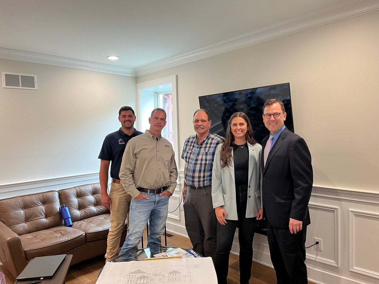 GTG holding a meeting in their office in Central, NJ