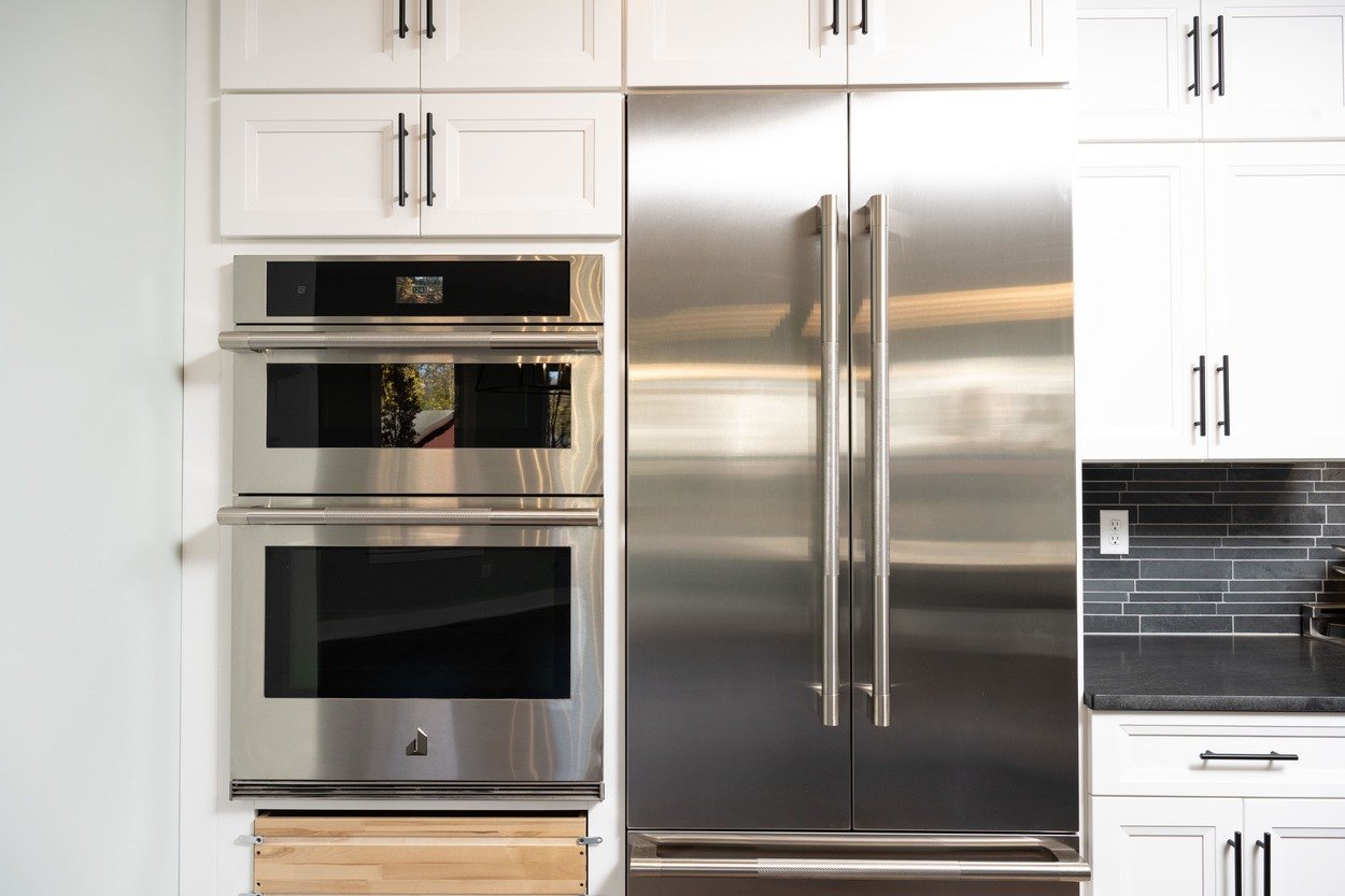 kitchen with built in microwave oven and fridge in custom home by GTG Builders in Central New Jersey