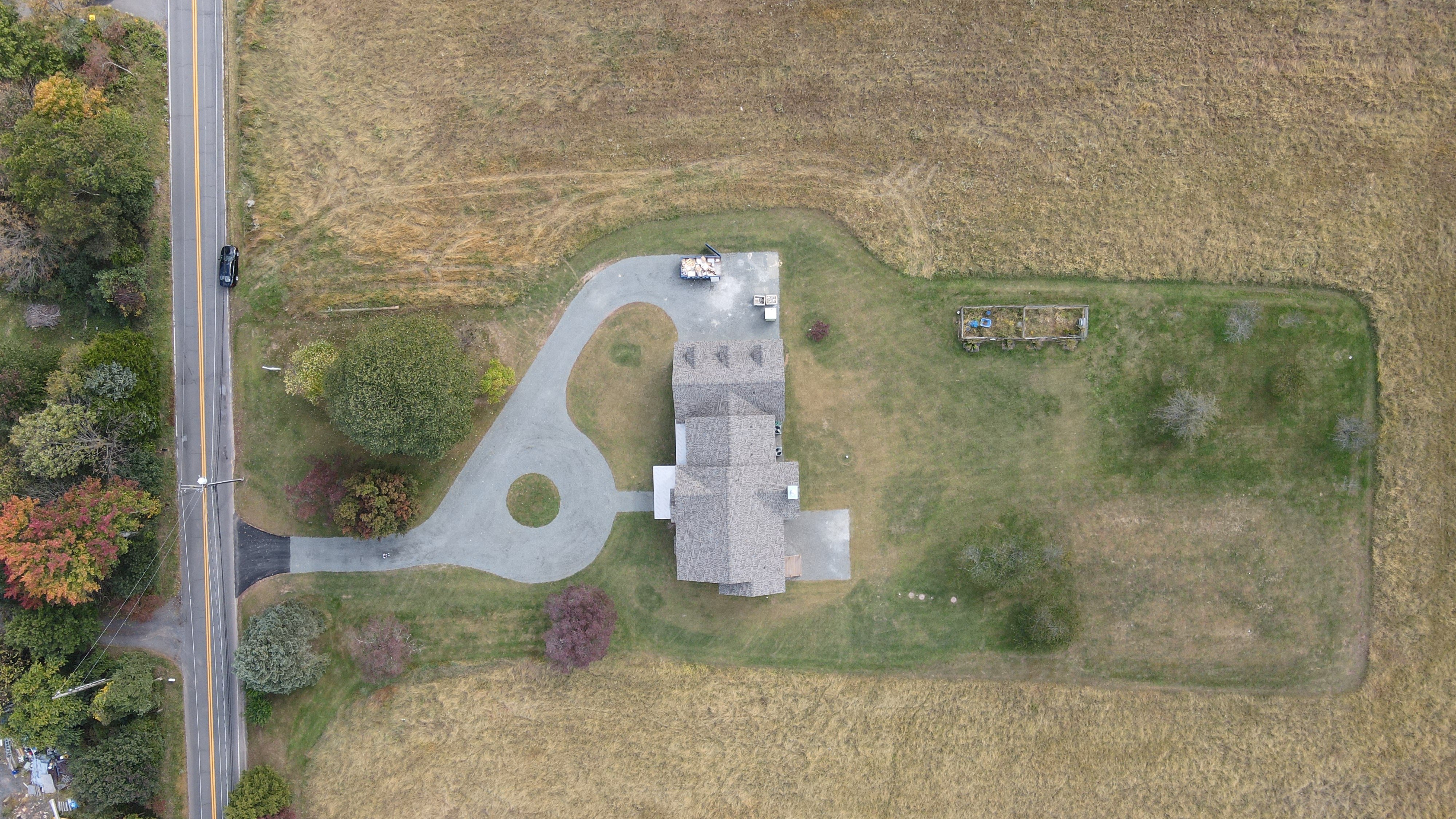 purchased land arial view with custom home built by gtg builders in new jersey