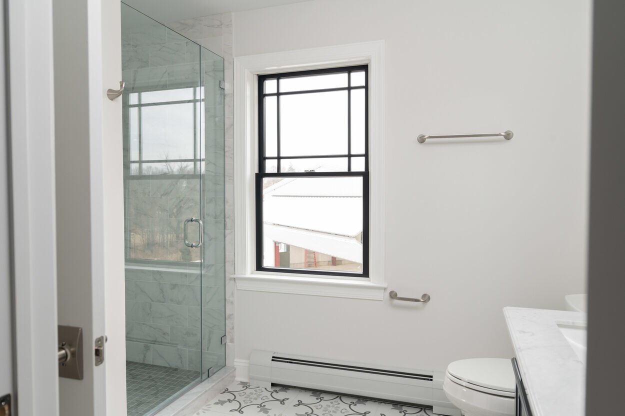guest bathroom with walk in shower by gtg builders in new jersey