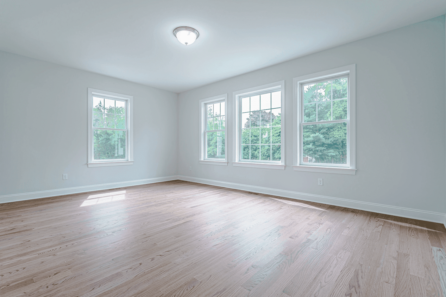 room with windows in custom home by gtg builders in central new jersey
