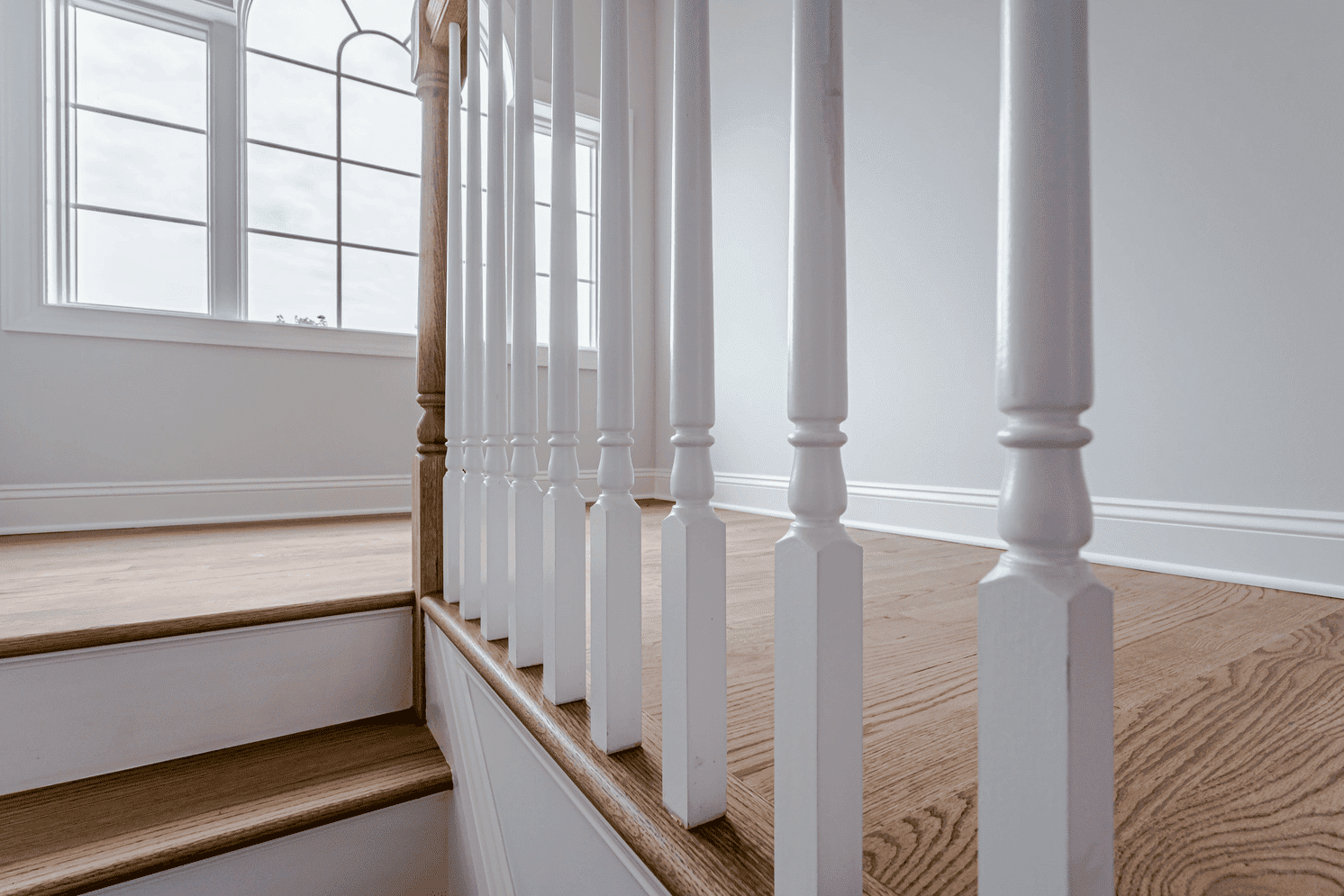 close up shot of staircase in custom home by gtg builders in central new jersey