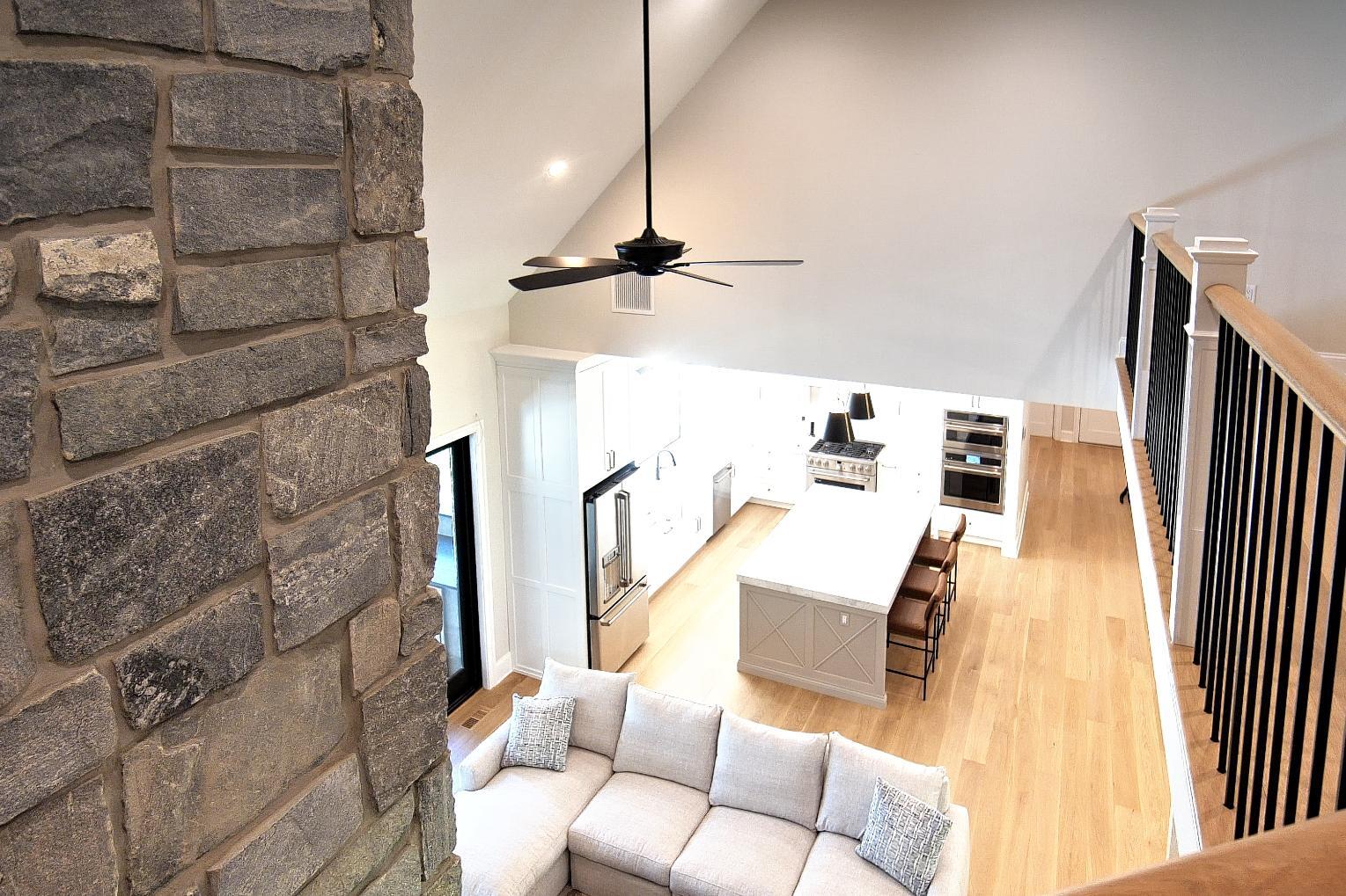 Great Room Overlook from the Stairs in Automated Home in Tewksbury by GTG Builders Great Room Overlook from the Stairs in Automated Home in Tewksbury by GTG Builders