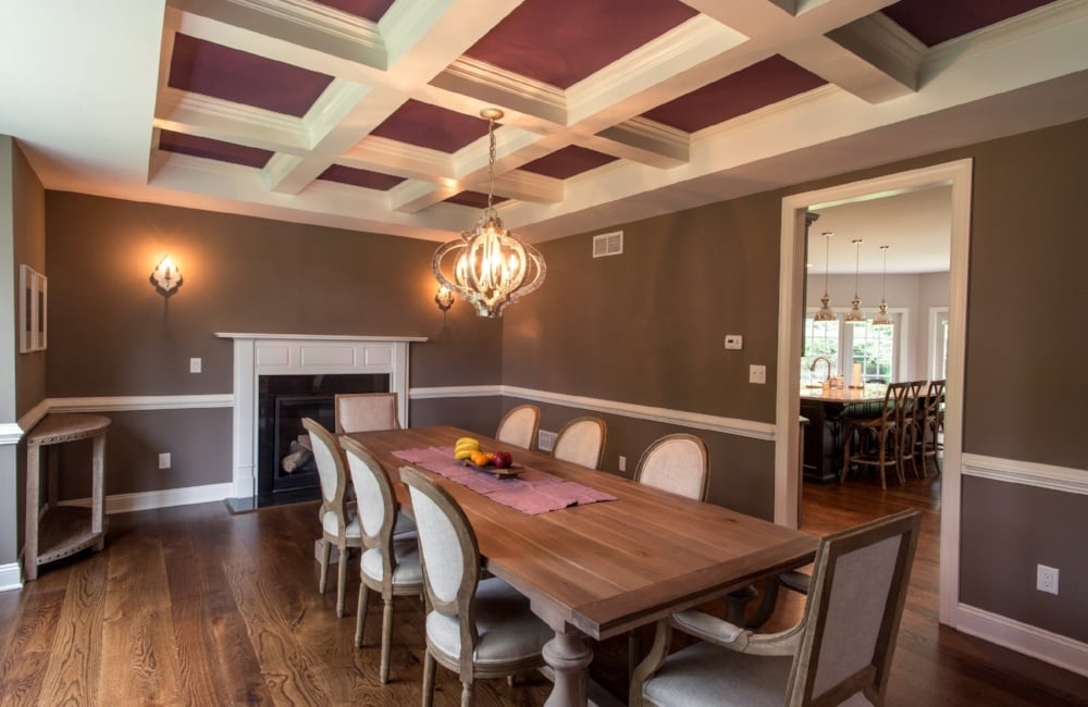 dining room with hardwood floors and checkered ceiling in custom home by gtg builders in central new jersey