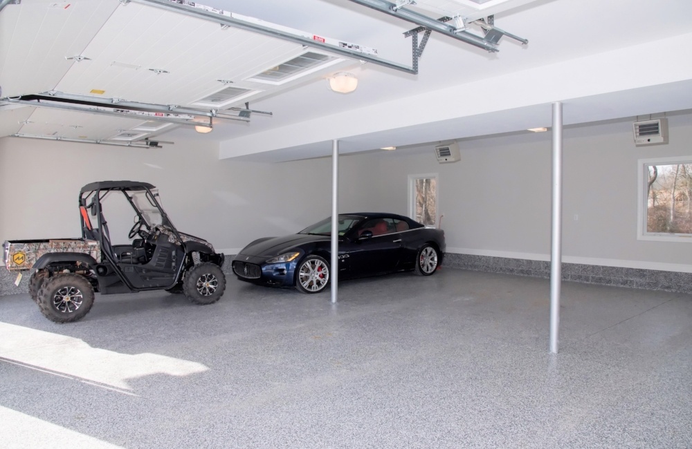 interior of 3 car garage in custom home by gtg builders in central new jersey